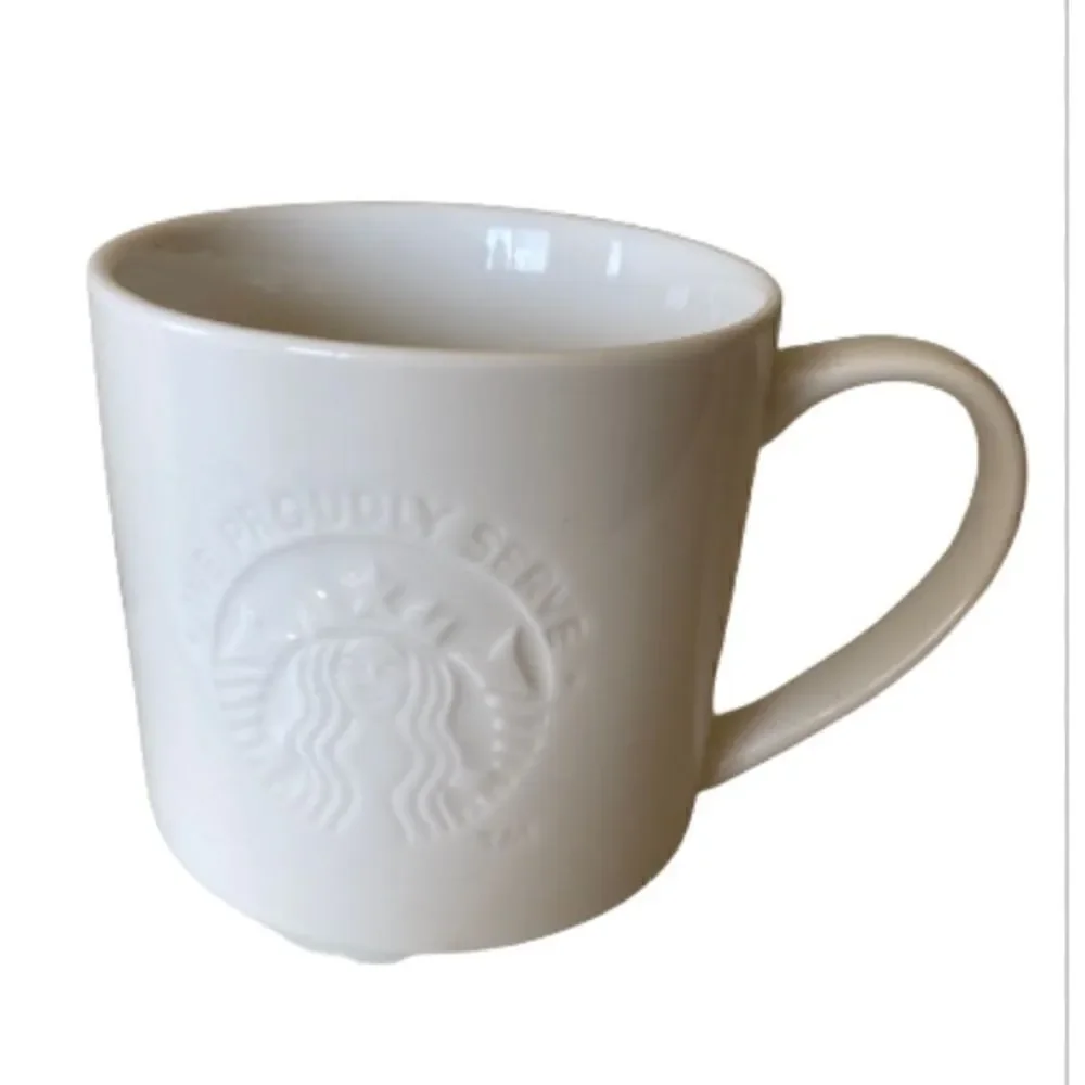 Starbucks 2014 White Embossed Coffee Cup Mug 12oz